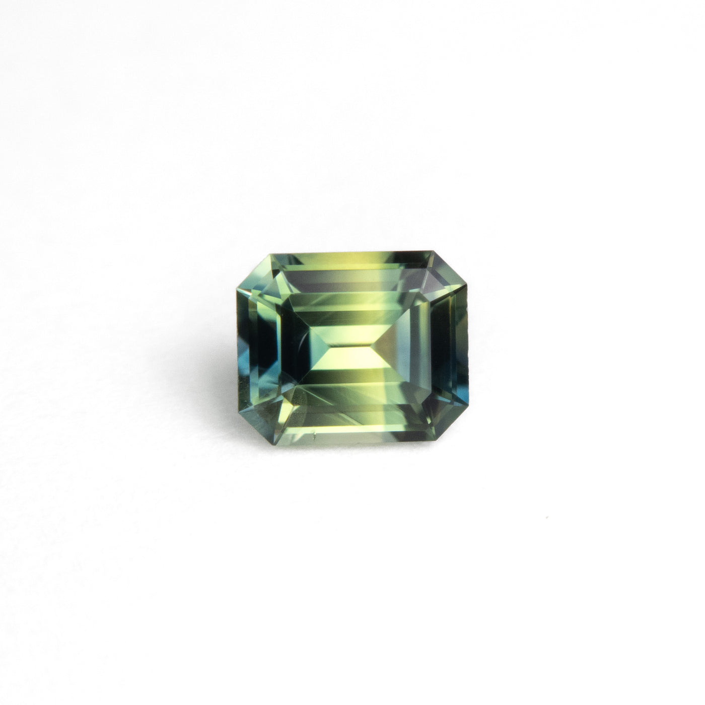 0.69ct Green Teal Parti Emerald Cut Sapphire