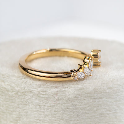 A unique 14KT yellow gold open ring with a combination of Round and Marquise Diamonds. 
