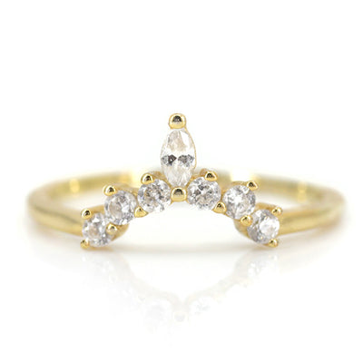 A gold ring featuring a delicate wave design adorned with sparkling round and marquise-cut diamonds. 