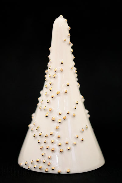 Smooth, white, cone shaped jewelry holder adorned with small golden beads.